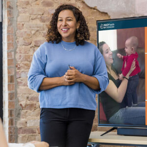 Parenting class educator presenting parenting videos using InJoy's Parenting Video Library