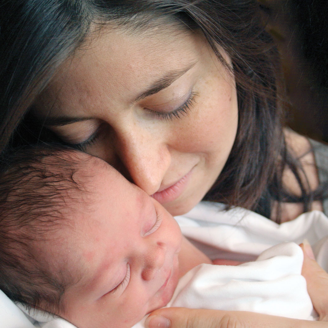 Mom holding newborn baby