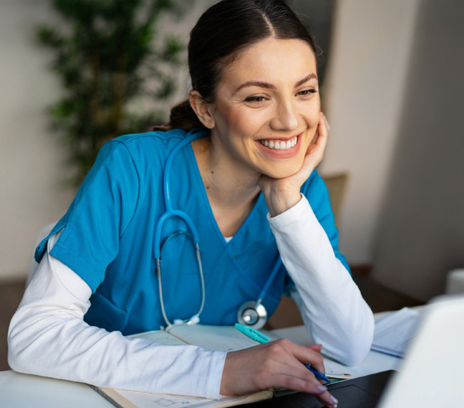 A nurse taking InJoy Staff Training Courses on her computer.